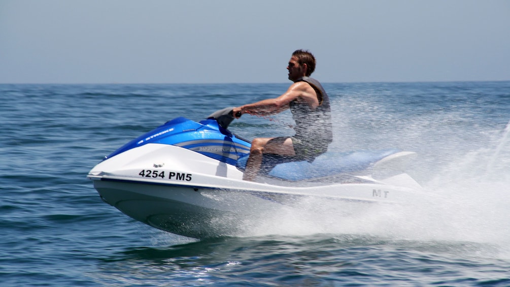 Jet skiing man off the coast of Algarve