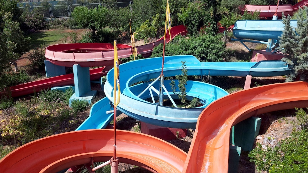 colorful coiling waterslides at the waterpark in Greece