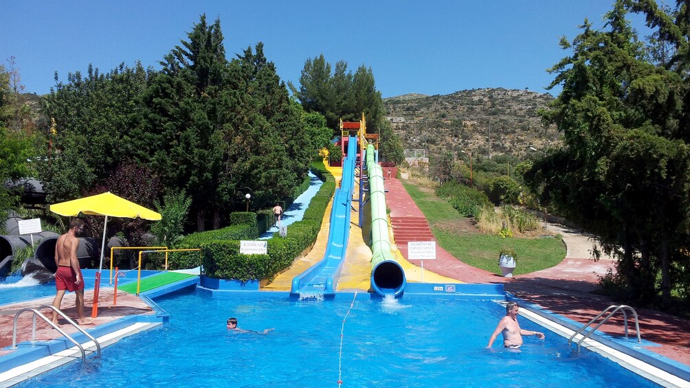 waterslide at the end of the pool at the waterpark in Greece