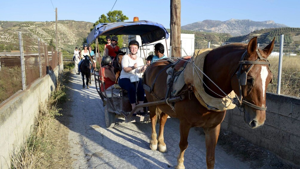 riding on a horse drawn carriage in Crete