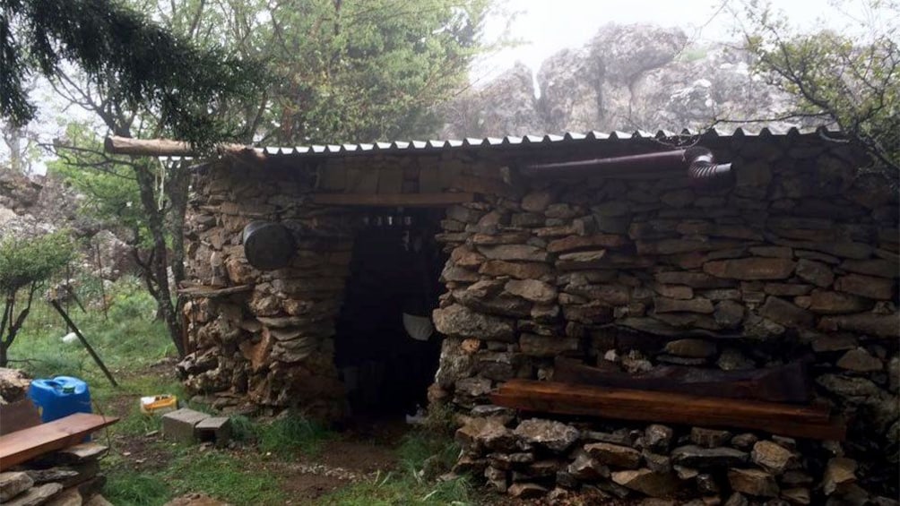 aluminum roofed stone dwelling in Greece