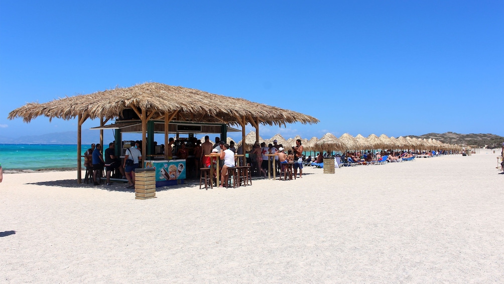 People enjoying their time on a beach in Heraklion 