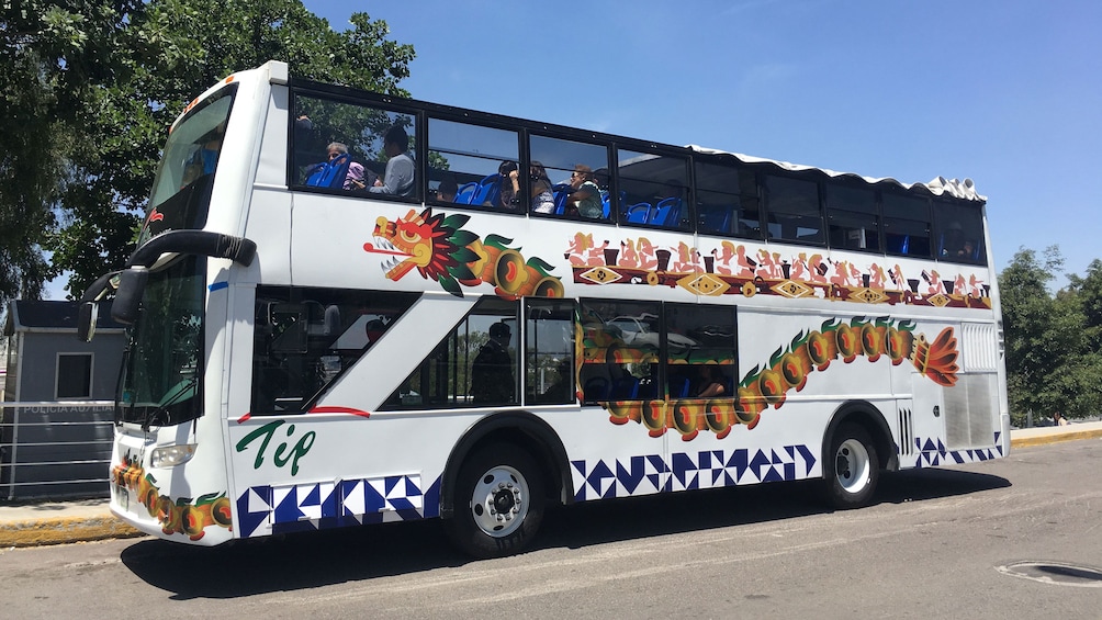 Tourists on double decker tour bus in Puebla