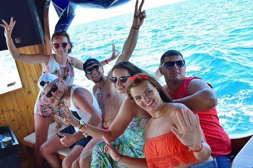 Group of friends enjoying our boat trip