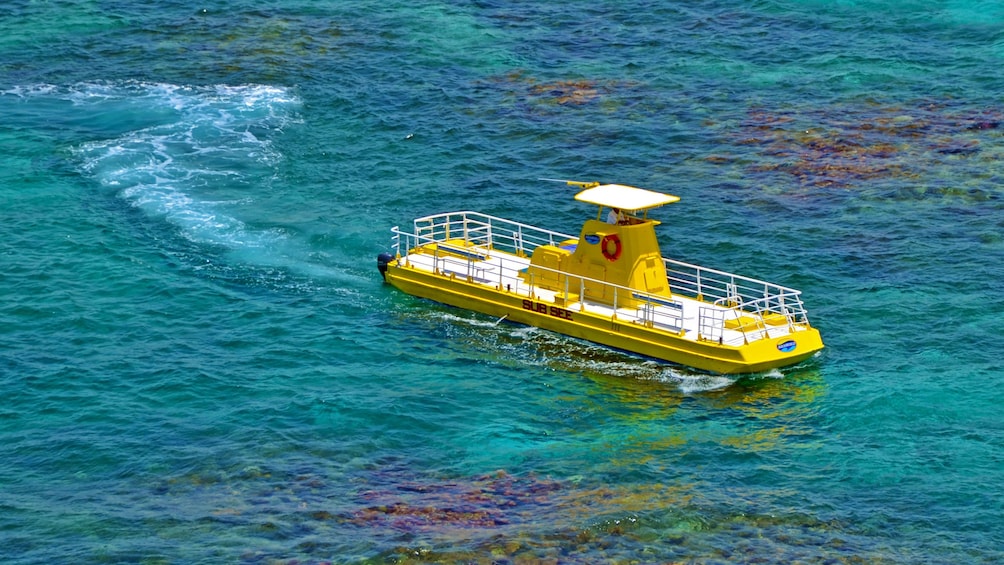 Subsee boat tredding waters in Mexico