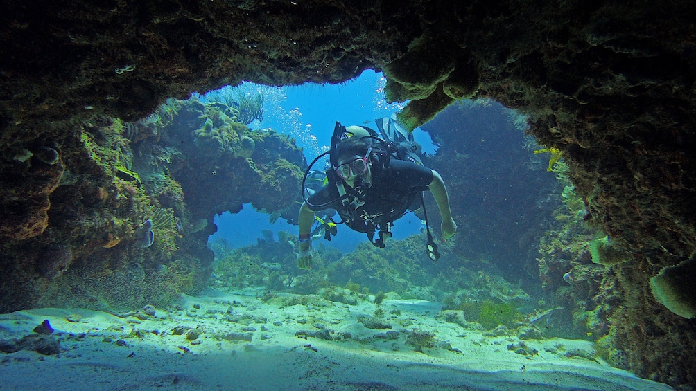 Diver at an underwater cave in Mexico