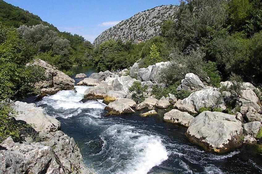 Private rafting on Cetina river with elements of canyoning & cliff jumping