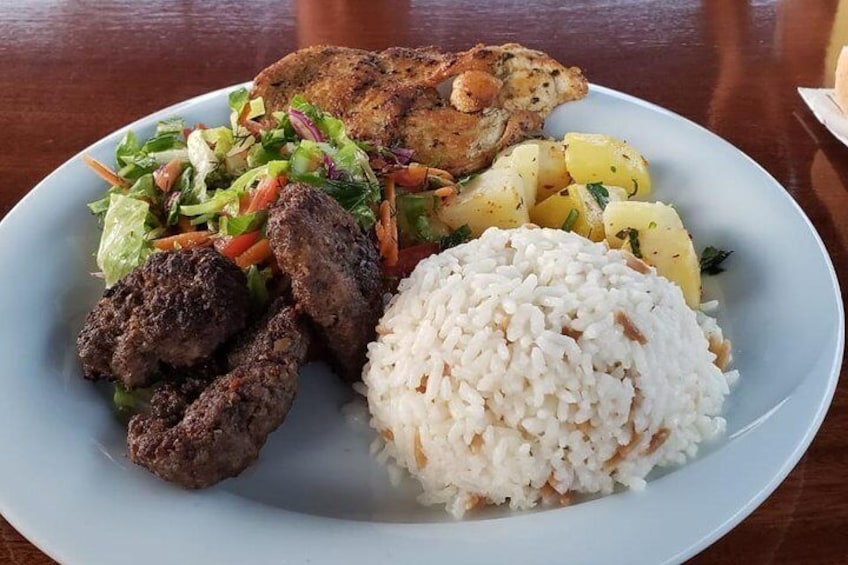 Dinner on board, meatballs, chicken, salat, potatoe salad and rice.