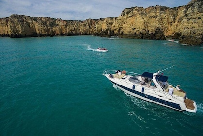Full day private yacht from lagos with drinks, tapas, paddle boards and kay...