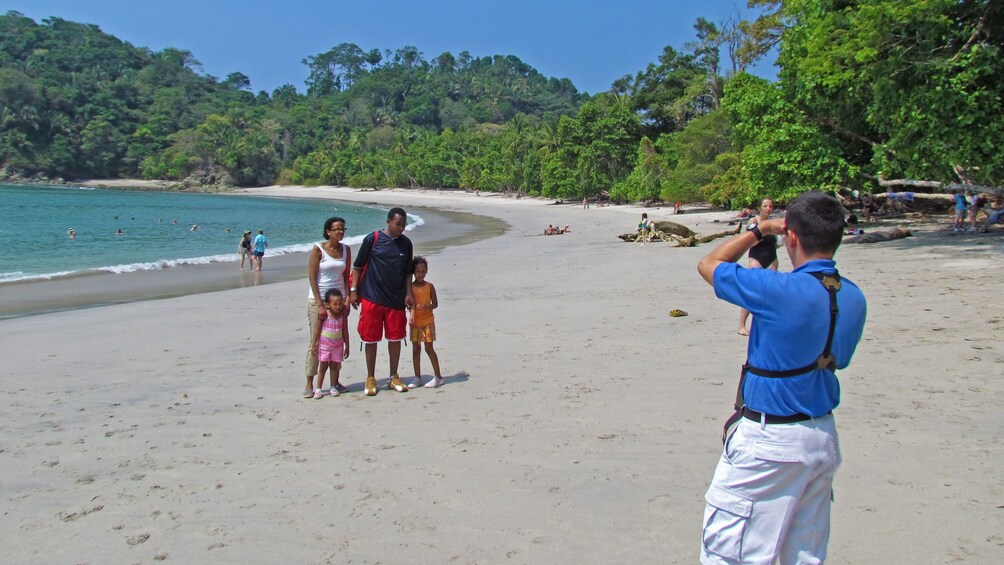 Show item 3 of 10. Taking a group photo at the national park in Jaco