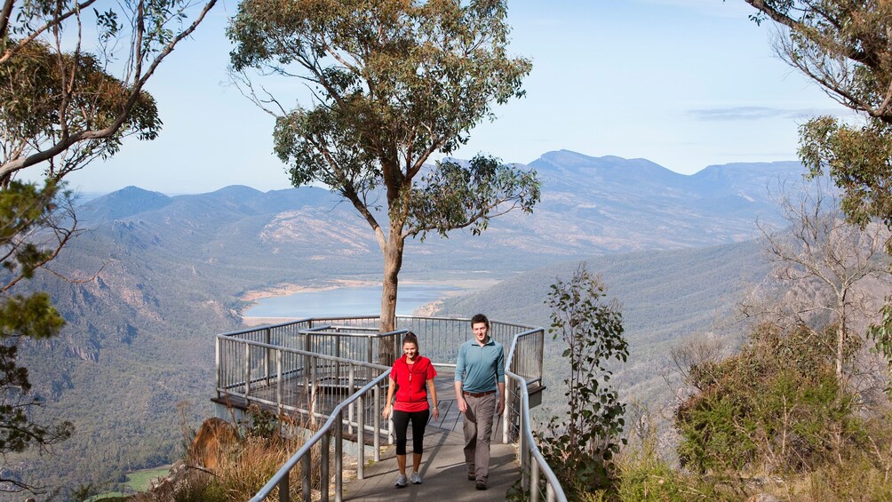 Show item 4 of 10. People walking back from lookout in Melbourne