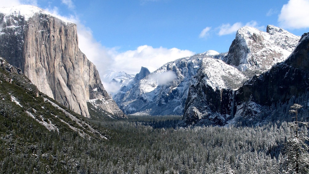 Snow-covered mountains and forest at Yosemite in California