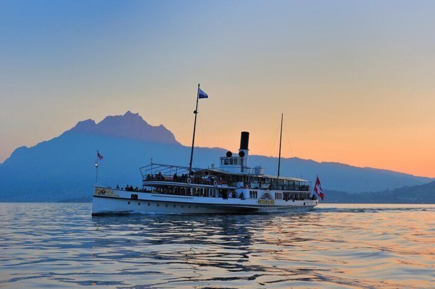 Boat on Lake Lucerne with Mount Pilatus
