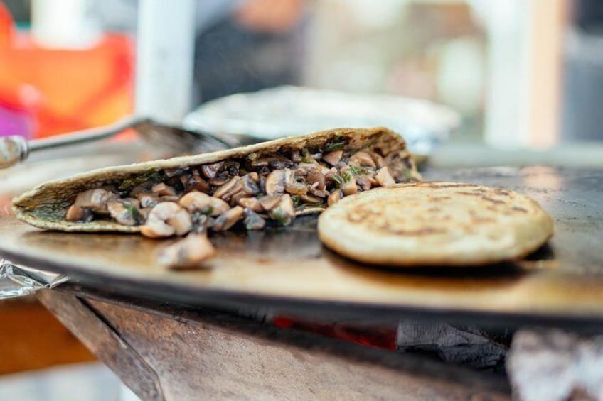 Try the iconic & delicious taco al pastor in your private tour
