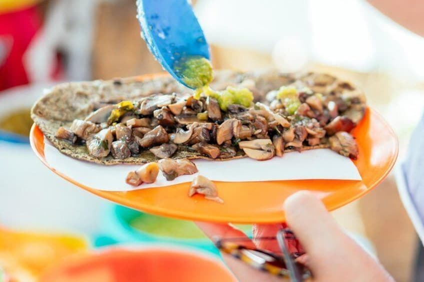 Try the iconic & delicious taco al pastor in your private tour

