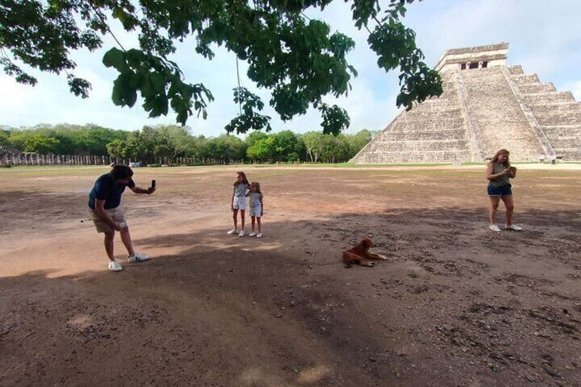 Chichen Itza and cenote in a mayan community