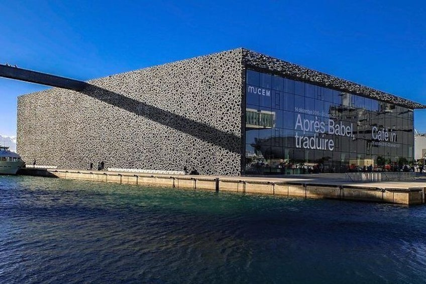 The MUCEM, huge building at the seaside, to discover with its footbridge over the water to reach Fort Saint-Jean