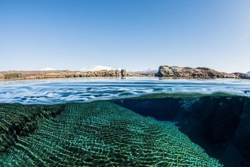 The view above and below in Silfra lagoon