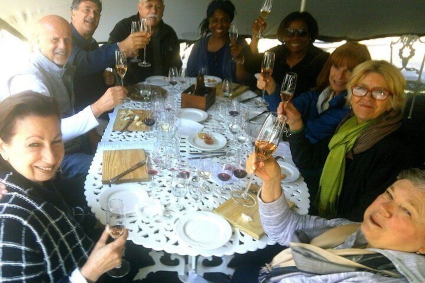 Charcuterie and wine tasting... and everyone looks well satisfied