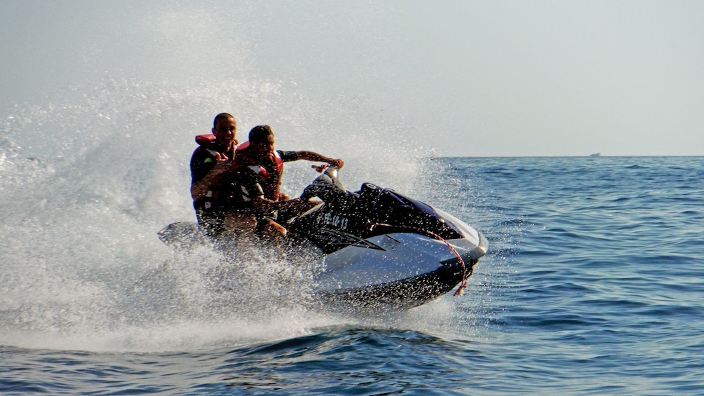 Couple on a jet ski in Spain