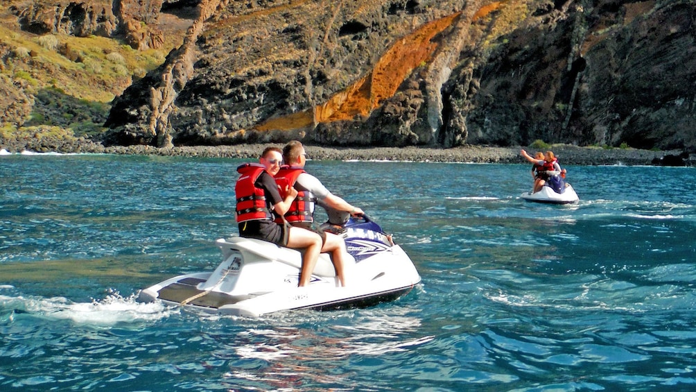 Jet ski group exploring the coast in Spain