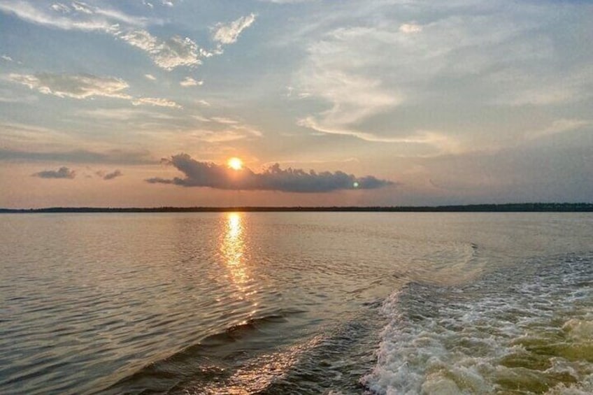 A beautiful Orange Beach sunset left in the boat wake
