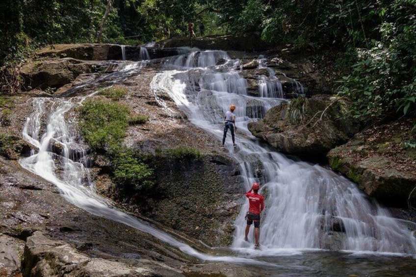 Waterfall Rappelling at Belize Bocawina Rainforest Falls