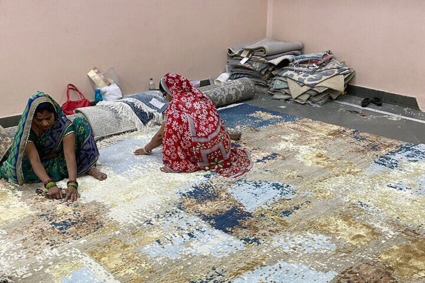 Carpet trimming by ladies 