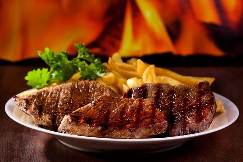 Dining at Al Areesh restaurant with Abu Dhabi city tour