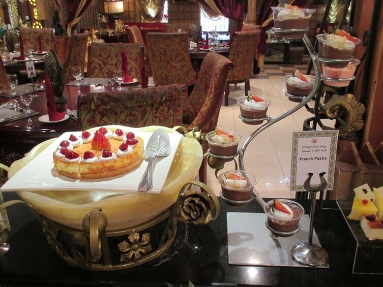 Dining at Al Areesh restaurant with Abu Dhabi city tour