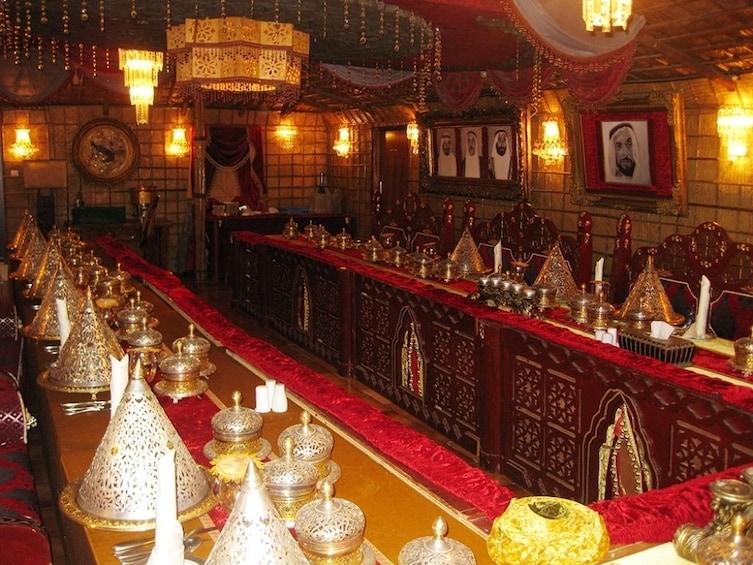 Dining at Al Areesh restaurant with Abu Dhabi city tour