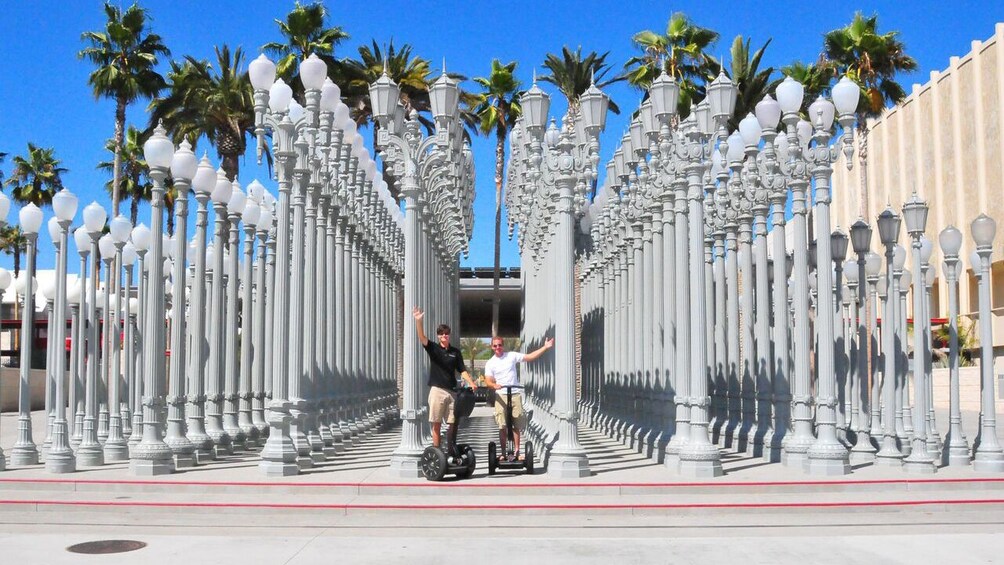 Segway pair at the Urban Light streetlamp sculpture in Los Angeles