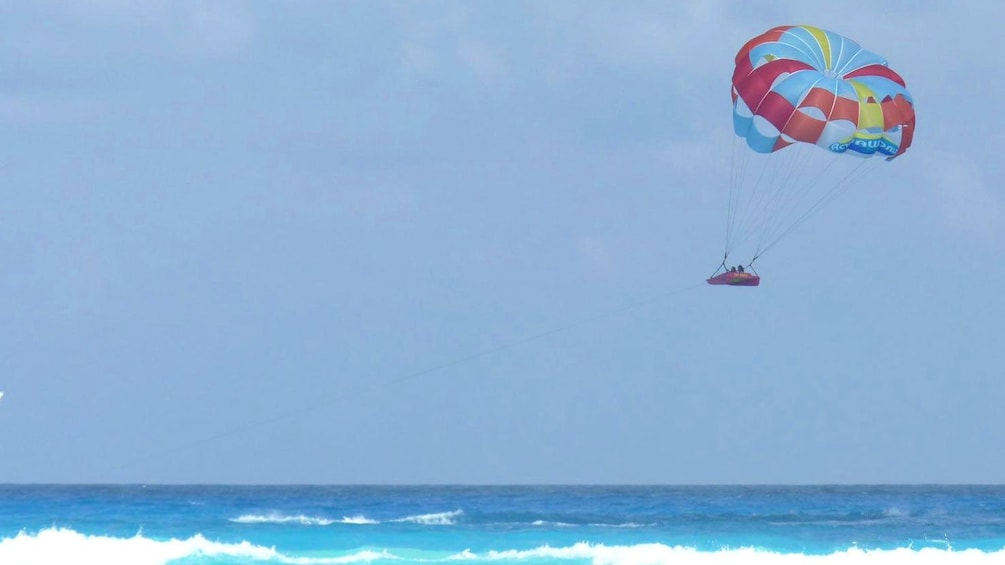 parasailing inside a small raft in Miami