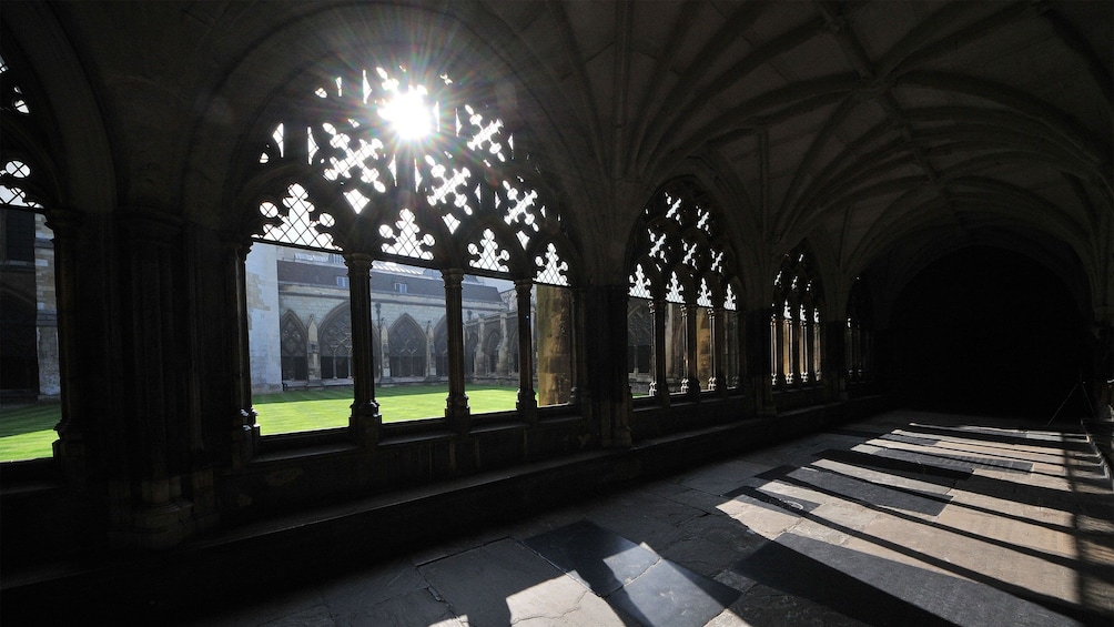 Sun shining through cloister in Westminster Abbey in London