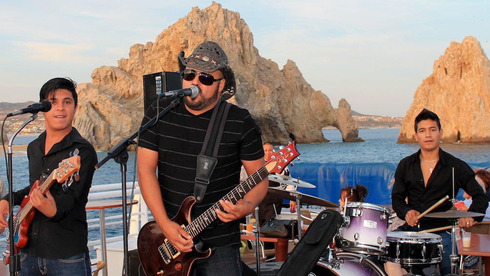 musicians performing on the deck of the cruise in Los Cabos