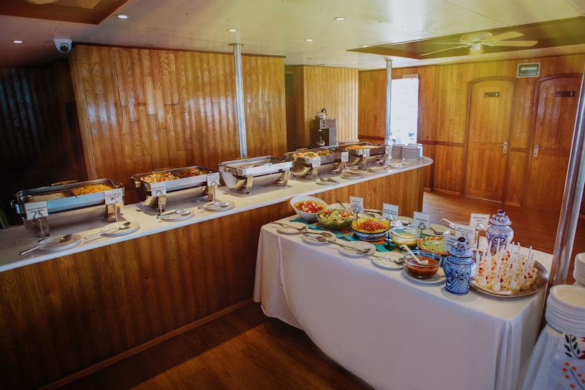 Caborey Sunset Dinner Cruise with Live Music & Buffet
