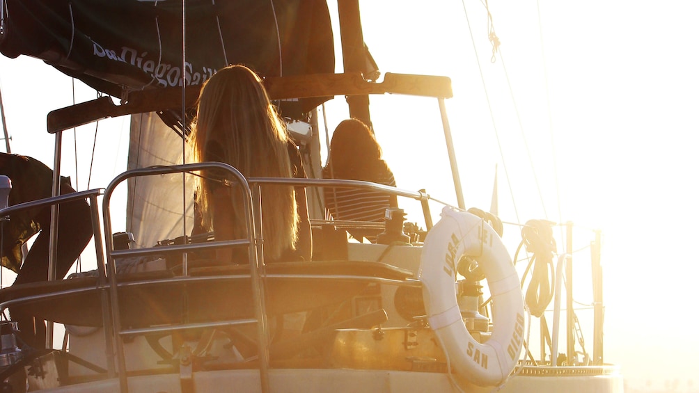 People on deck of sailboat in San Diego