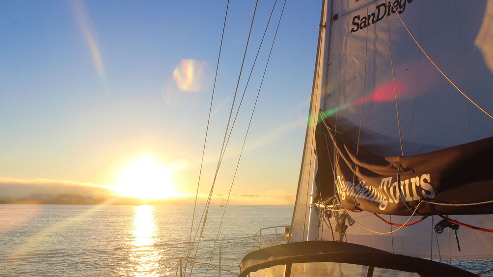 View of sunset from deck of sailboat in San Diego