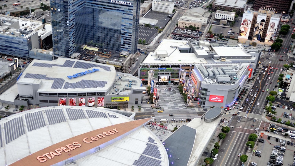 riding the helicopter through the busy city of Los Angeles