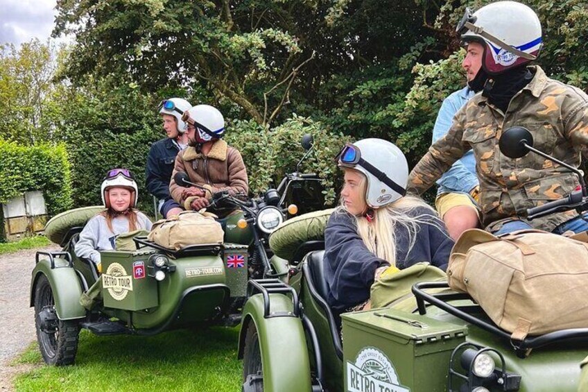 Our passengers comfortably seated in our vintage sidecars