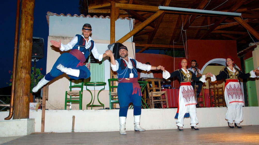 Traditional greek dancers performing at Cretan Night with Live Music & Dance in Crete