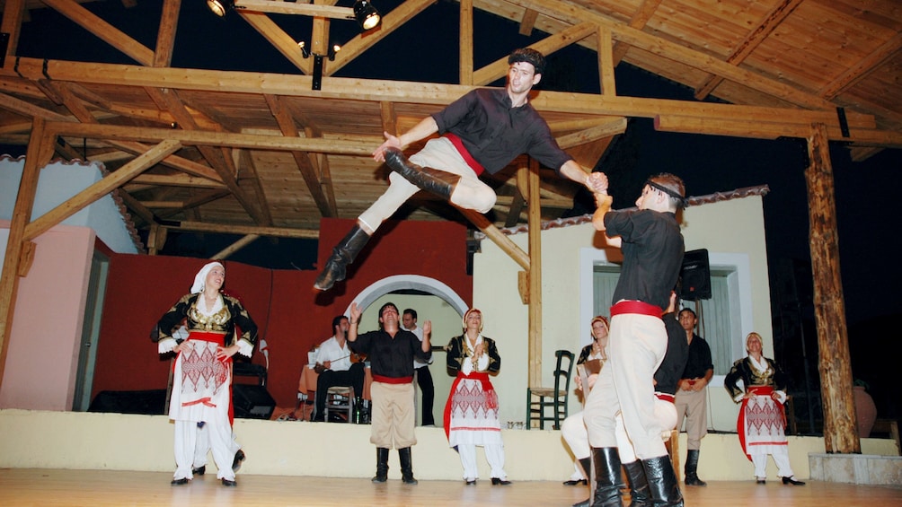 Traditional greek dancers at Cretan Night with Live Music & Dance in Crete