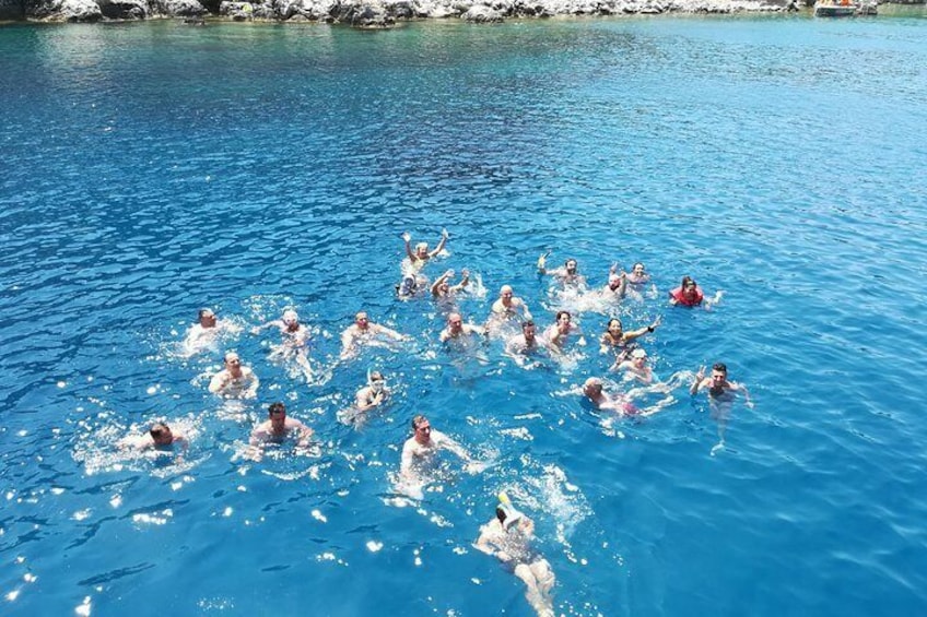 Sunset Cruise with a Swimming Stop at Kalithea Bay