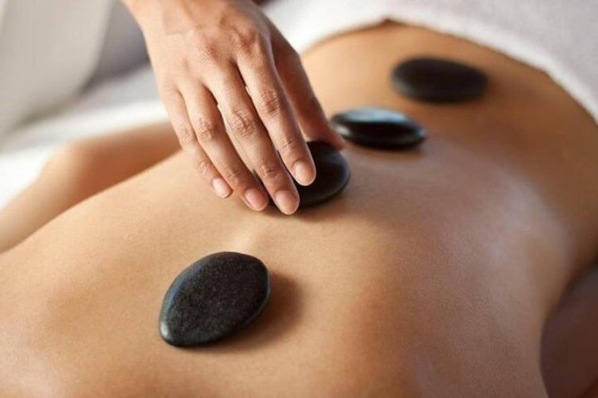 Warm stone Massage At Bali Luxury Spa