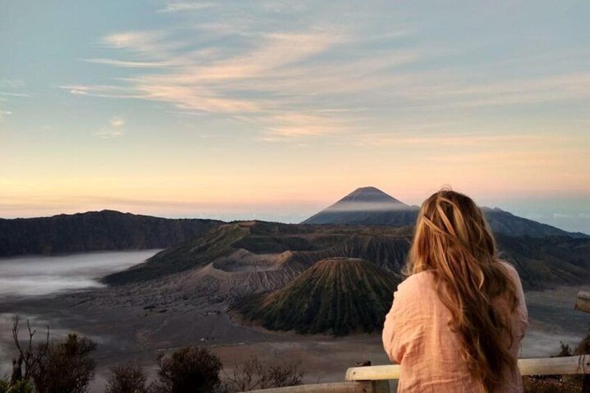 Taking a photo with Mount Bromo