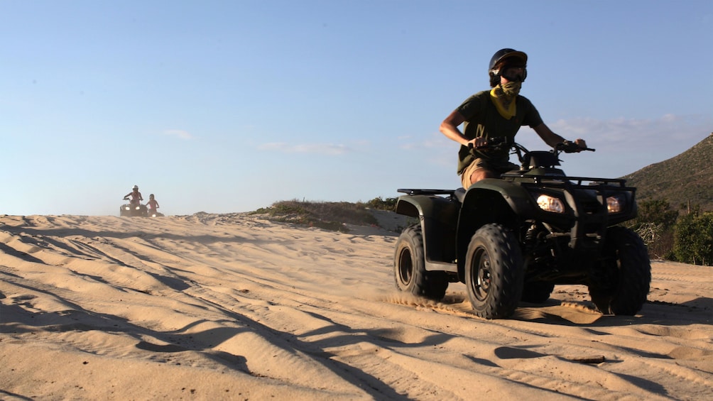 ATV rider on the beach