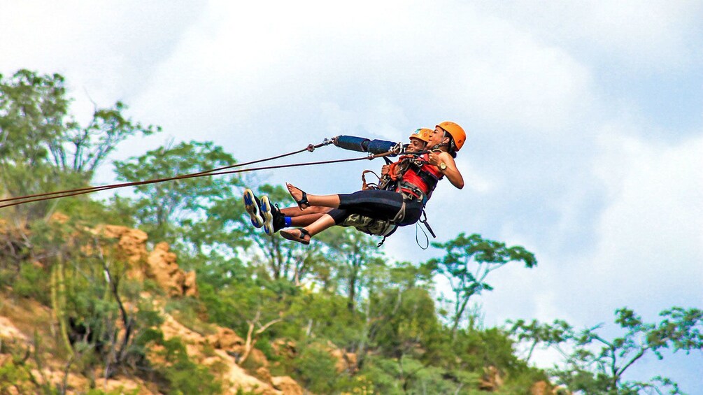 Show item 3 of 10. Swinging at great heights in Los Cabos