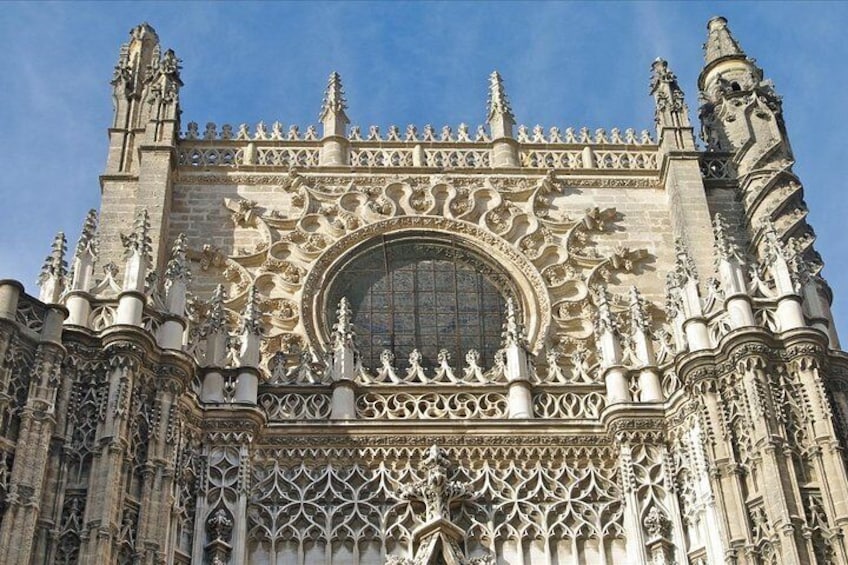 Travel from Cadiz to Seville and visit its Monuments.