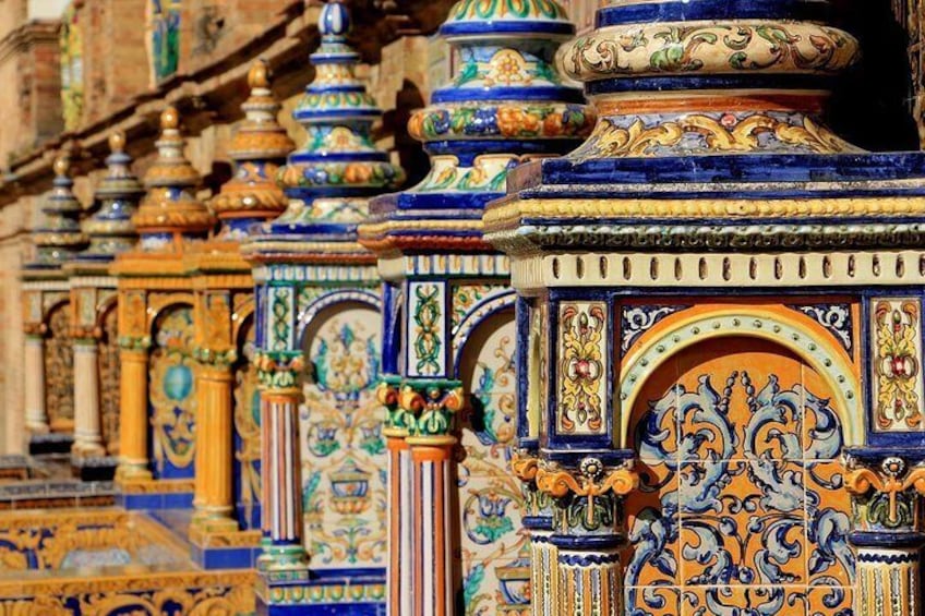 Travel from Cadiz to Seville and visit its Monuments.
