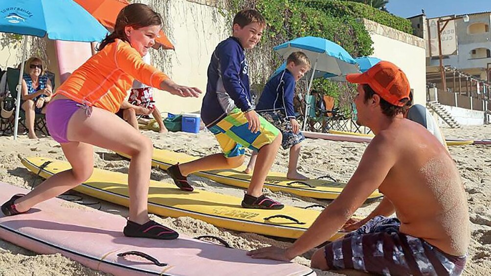 Kids surf simulation on land in Lose Cabos